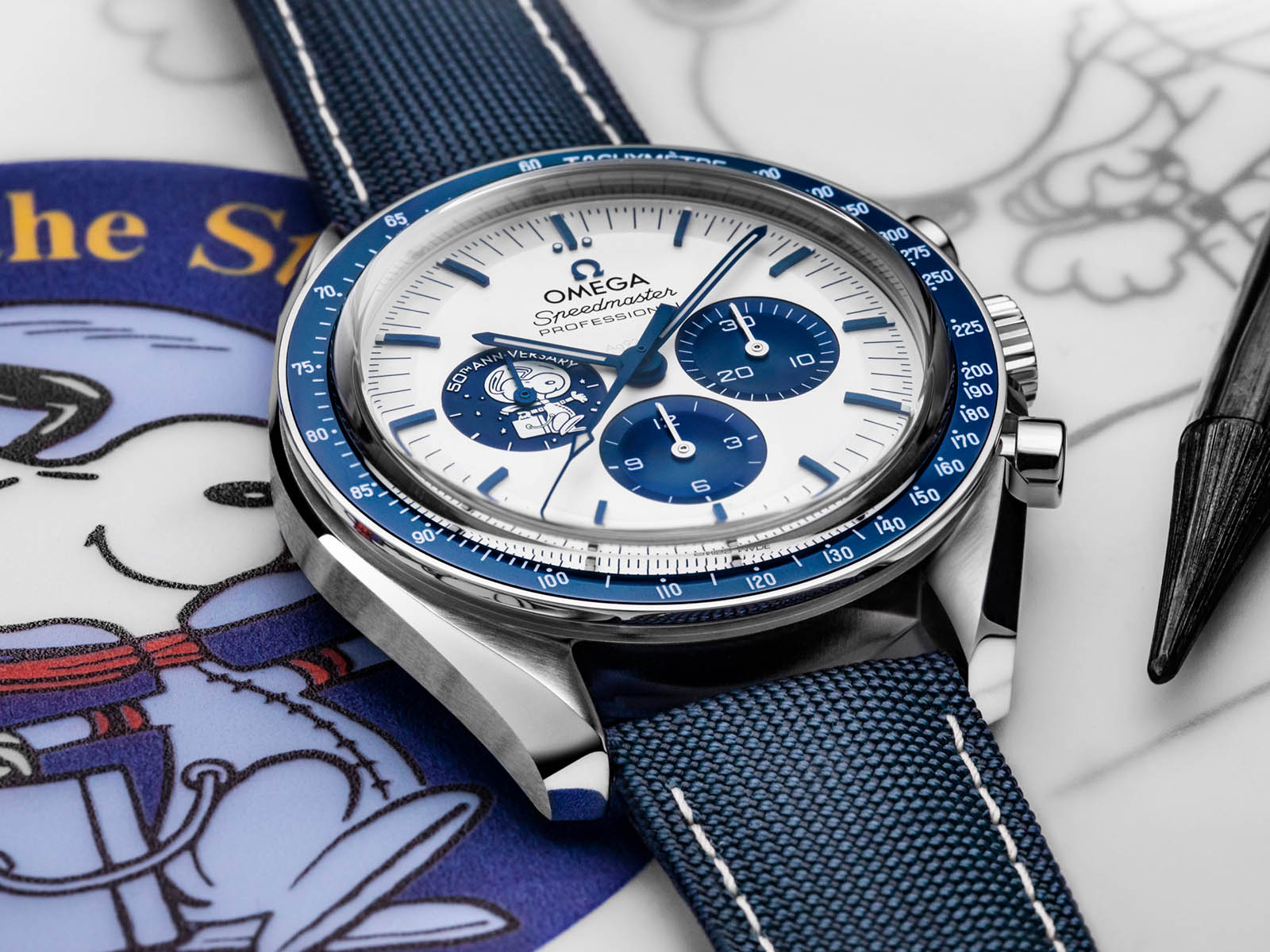 310-32-42-50-02-001-omega-speedmaster-silver-snoopy-award-50th-anniversary-2.jpg